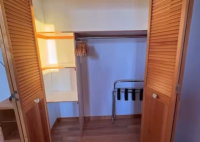 Large built-in closet in Bedroom 1 with organized shelving, ideal for long-stay visitors in Nunavut.