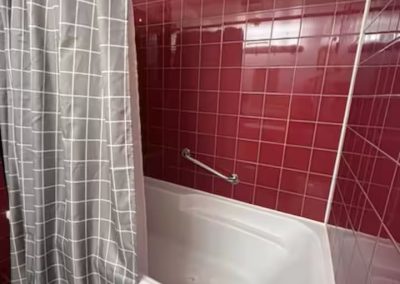 Shared full bathroom for Bedroom 4 at Stay by the Sea B&B in Iqaluit, Nunavut, featuring a tub/shower combo, modern amenities, and guest-ready comfort.